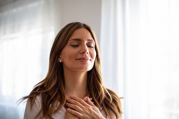 Person practicing mindful breathing